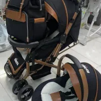 کالسکه رو به مادر شو و کریر در حد آک بدون ساک