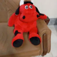 عروسک گاو قرمز