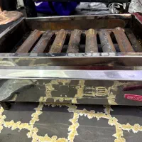 اجاق گازی کباب پز هفت شعله در حد نو کاملا سالم