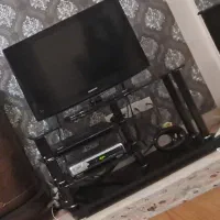 میز تلویزیون شیشه ای کاملا تمیز