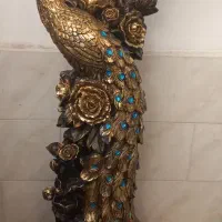 ساعت طرح طاووس