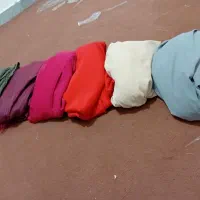 مقداری پارچه زیر قیمت فاکتور
