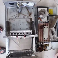 تعمیرات تضمینی انواع پکیج آبگرمکن و گاز صفحه ای|خدمات پیشه و مهارت|یزد, |دیوار