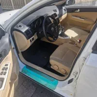 ماشین برلیانس ۳۲۰ کراس فول آپشن و سقف پانا اتومات