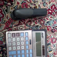 ماشین حساب ومنگنه کوب
