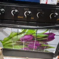 تخت دوطبقه باتشک درحد نو و اجاق گاز پنج شعله