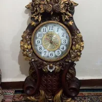ساعت دیواری طرح چوب