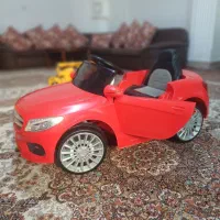 ماشین شارژی دو موتوره درحد نو ومیز تلفن کاملا سالم