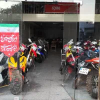 نیروی کار در فروشگاه فروش موتور سیکلت