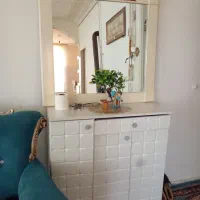 جاکفشی همراه با اینه