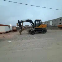 بیل میکانیکی،باغ،گوددرخت،کانال،استخر