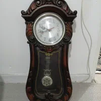 ساعت دیواری ساده . پاندول دکوری ست.