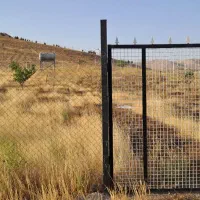 زمین فنس دار در جامع مهندسین فدک، شفیع آباد
