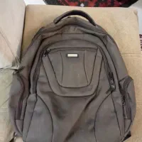 کوله پشتی تلفن رومیزی مودم فلاشر عکاسی