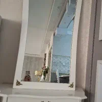 ساعت ایستاده و آینه