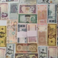 دو بسته اسکناس 10 تومن و 20 تومنی و تعدادی اسکناس