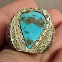 انگشتر نقره دست ساز قلمزنی استاد مسافر فیروزه