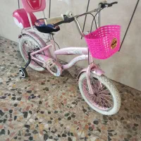 دو عدد دوچرخه 16 صورتی و قرمز در حد نو سالم