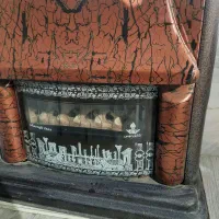 بخاری طرح شومینه شارق طوس وکودک مرواریدسوز