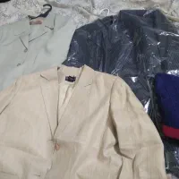 کت وشلوار مردانه  مشکی۶۰۰ سفیدبا جلیقه ۶۰۰نو