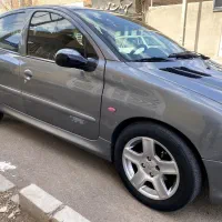 پژو206 بی رنگ و آفتاب کمکار.بالوازم دوبرگ فنی عالی