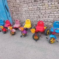 سه چرخه و اسباب بازی کودک