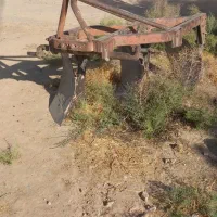 گاو آهن تراکتور با یه بیل عقب تراکتور