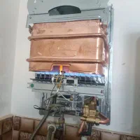 تعمیرات و تعویض آبگرمکن دیواری بوتان نو با کهنه