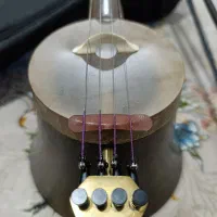 کمانچه احمد گنجی.|سازهای سنتی|خرم‌آباد, |دیوار