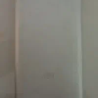 پاور بانک و گوشی ساده نوکیا