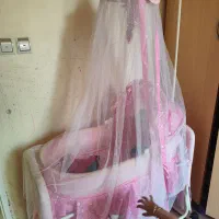 گهواره نوزاد دخترانه صورتی