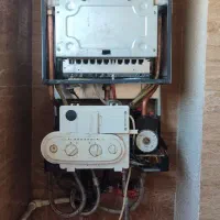 تعمیرسرویس پکیج نصب رادیاتور حوله خشک کن|خدمات پیشه و مهارت|هشتگرد, شهرک آپادانا|دیوار