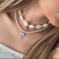 گردنبند و دستبند صدفی و دستبافت