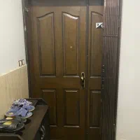 درب ورودی چوبی بهمراه چهارچوب و حفاظ آکاردئونی
