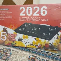 وسایل آشپزخانه یک عدد اجاق گاز صفحه ای  و فرن