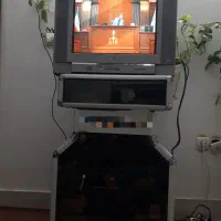 تلویزیون LG به همراه میز آلومینیوم