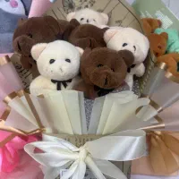 دست گل عروسک