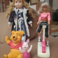 عروسک سرامیکی.باربی با دوچرخه ثابت.خرس قلک