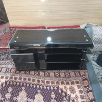 میز تلویزیون شیشه‌ای