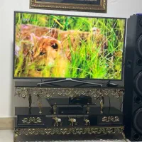 میز تلوزیون برنج خیلی تمیز و بدونه شکستگی