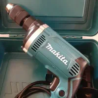 دریل ضربه ای ماکیتا HP1631