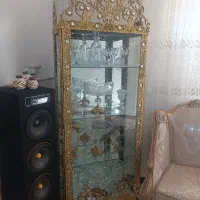 آینه و شمعدان و ساعت وویترین