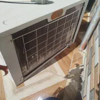 کولر پنجره ای جی به همراه قاب دیواری