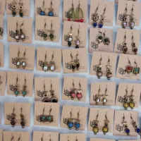 گوشواره سنتی و سنجاق گل سینه