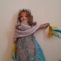 عروسک با لباس بختیاری