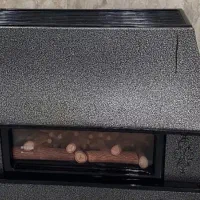 بخاری طرح شومینه کارکرده و البته تمیز