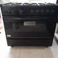 اجاق گاز فر دار و دو عدد بخاری