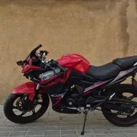 مگلی ۲۰۰ قرمز مشکی