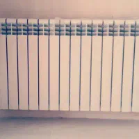 تاسیسات ساختمان نصب  راه اندازی رادیاتور و پکیج