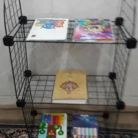 قفسه کتاب ودفترومجله یه تخفیف جزئی پای معامله